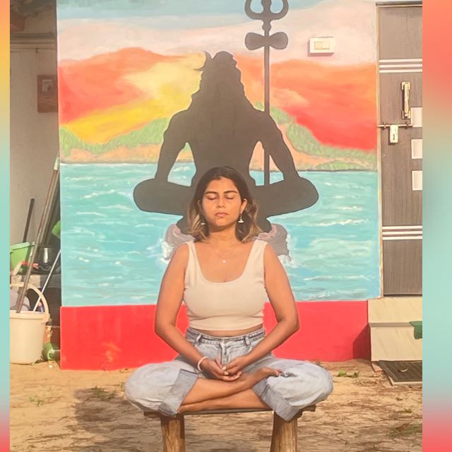 Kirti, founder of Back To Breath, sitting peacefully in meditation